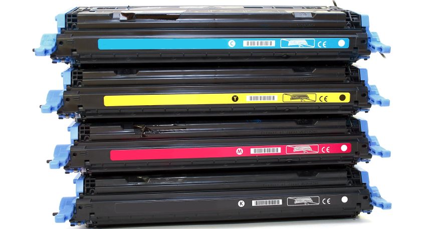 Four toner cartridges; a type of consumable used by laser printers.