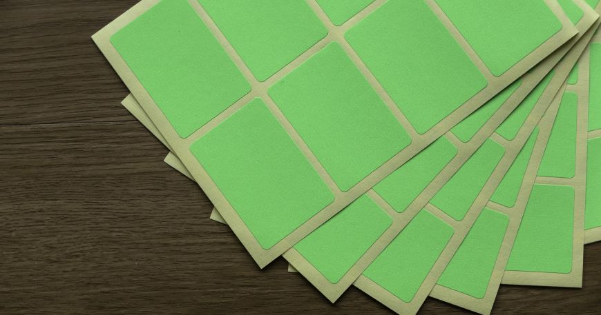 Six sheets of die cut labels. These green self adhesive labels have all been cut using a die. 
