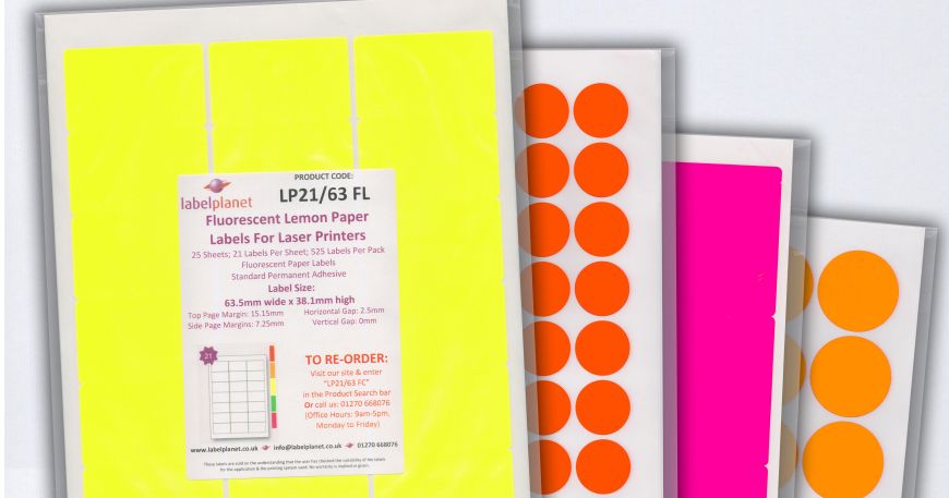 Four packs of our fluorescent labels; the third pack contains our fluorescent pink labels.