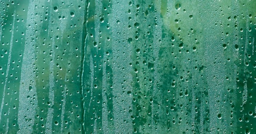 Condensation on a film of clear polyethylene; environments with high humidity can result in condensation (water vapour turns into liquid).