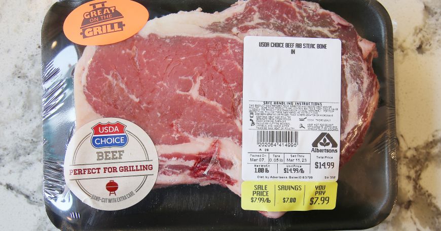 A packet of beef with a retail label applied on the right hand side of the packaging.