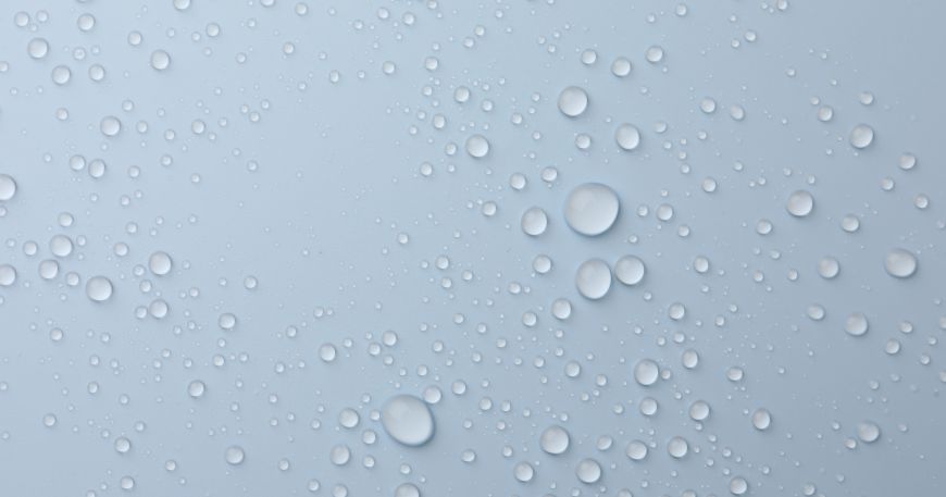 Drops of water on a splashproof material. 