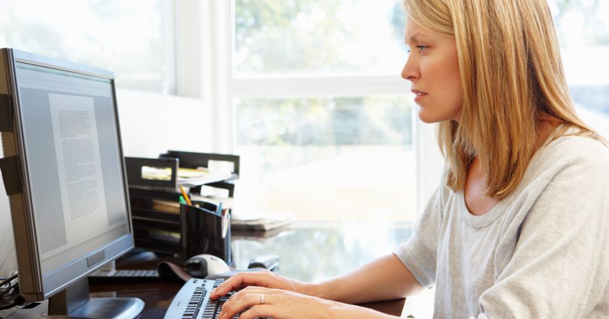 A person sits at a desktop computer and types text into word processing software. A word processor is a piece of software designed to process words; they are used to compose, edit, and format written materials. 