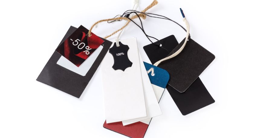A selection of different swing tags. A swing tag is attached to an item using a thread or tie rather than an adhesive.