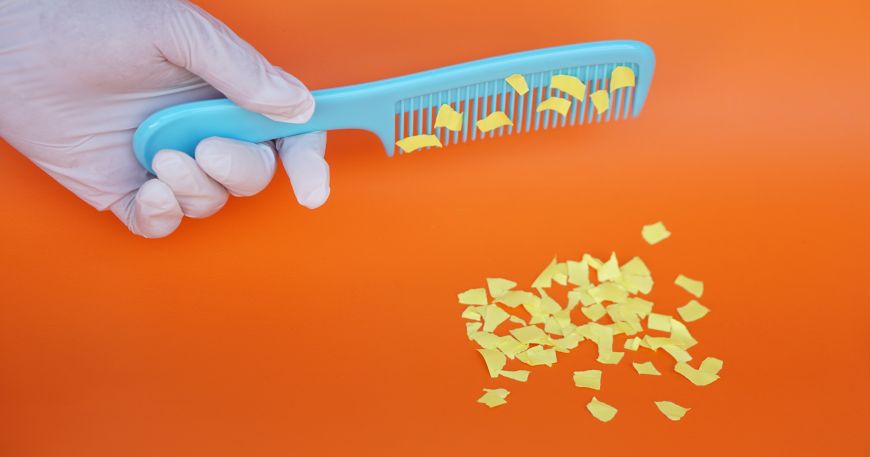 Static can be used to attract paper to a comb; this is the basic principle behind electrostatic printing, where static electricty is used to attract toner onto a surface before being bonded in place.