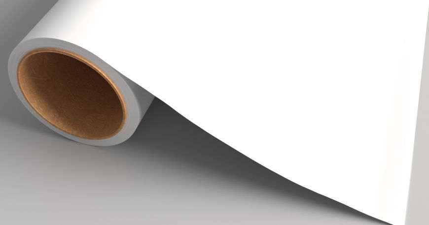 A roll of paper that is partially unrolled; the bleached paper has a bright white smooth surface.